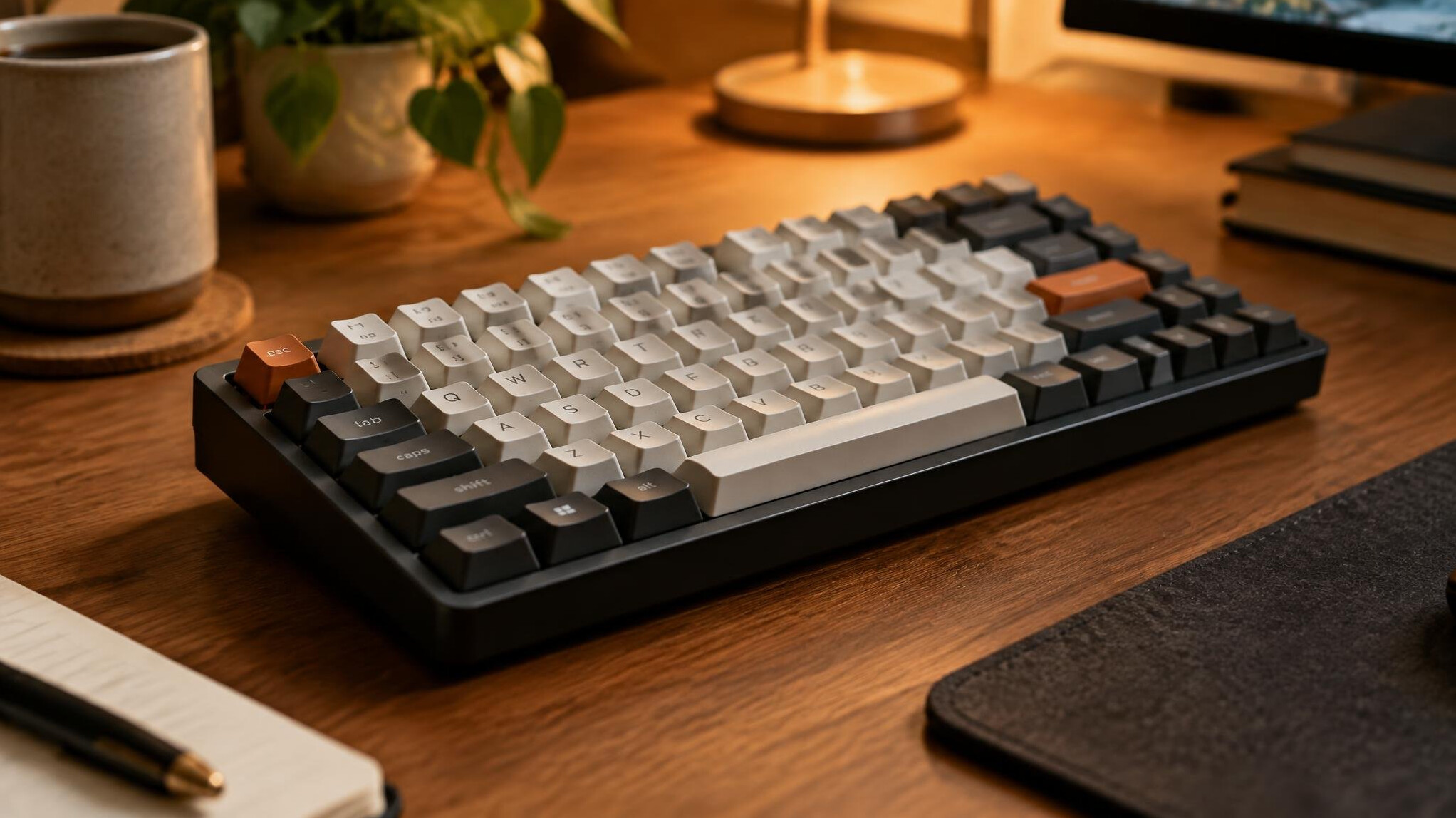 Close-up of a mechanical keyboard on a wooden desk
